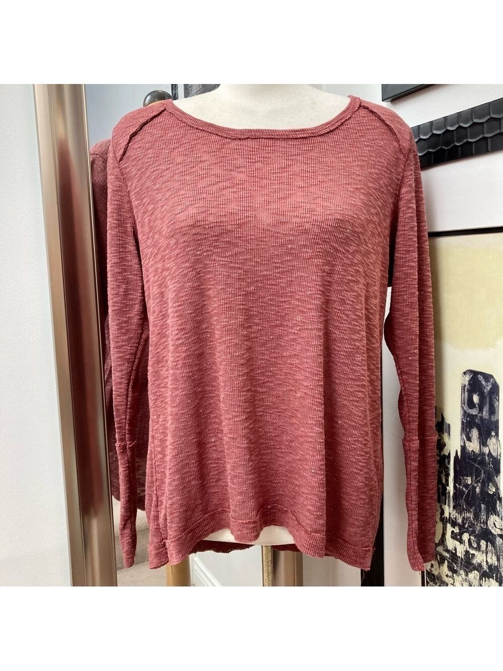 New burgundy waffle knit top with exposed seems.